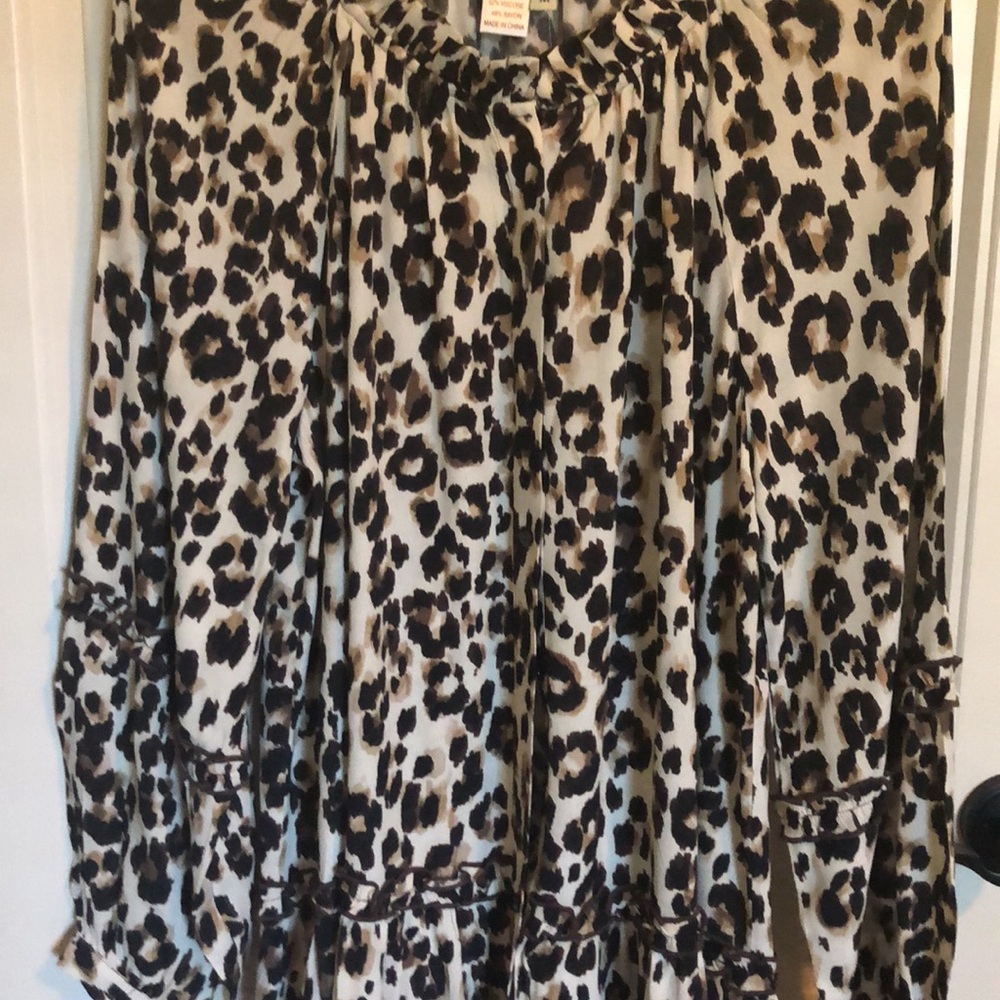Gorgeous dressy animal print blouse. New with tags.